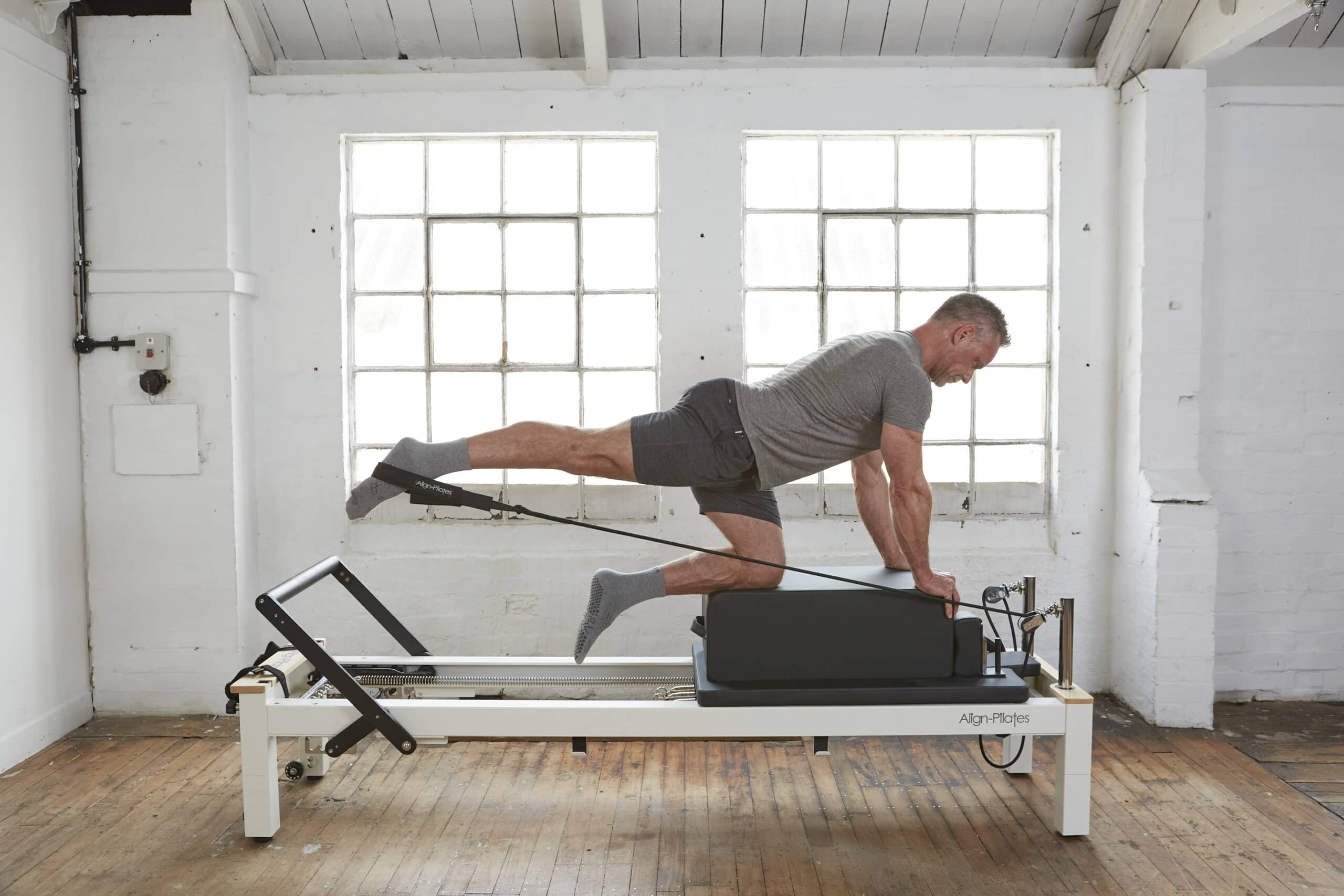 How to Incorporate a Pilates Sitting Box into Your Reformer Workouts